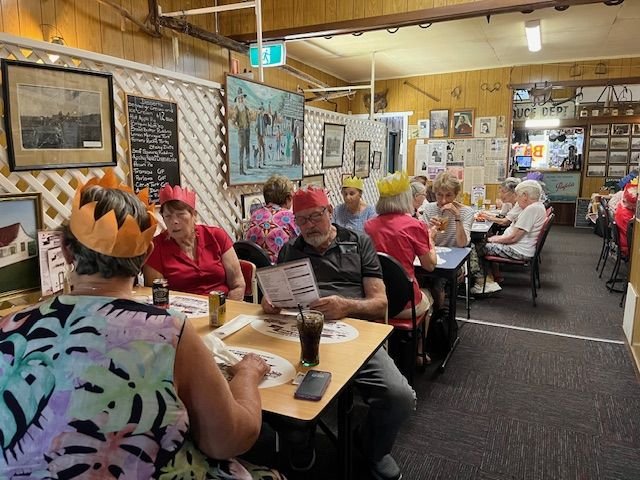 Members and guests enjoying a Christmas celebration lunch at Rudd's Pub, Nobby, as part of our final day-bus trip for 2025