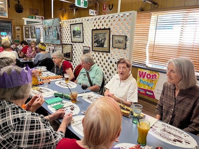 Members and guests enjoying a Christmas celebration lunch at Rudd's Pub, Nobby, as part of our final day-bus trip for 2025