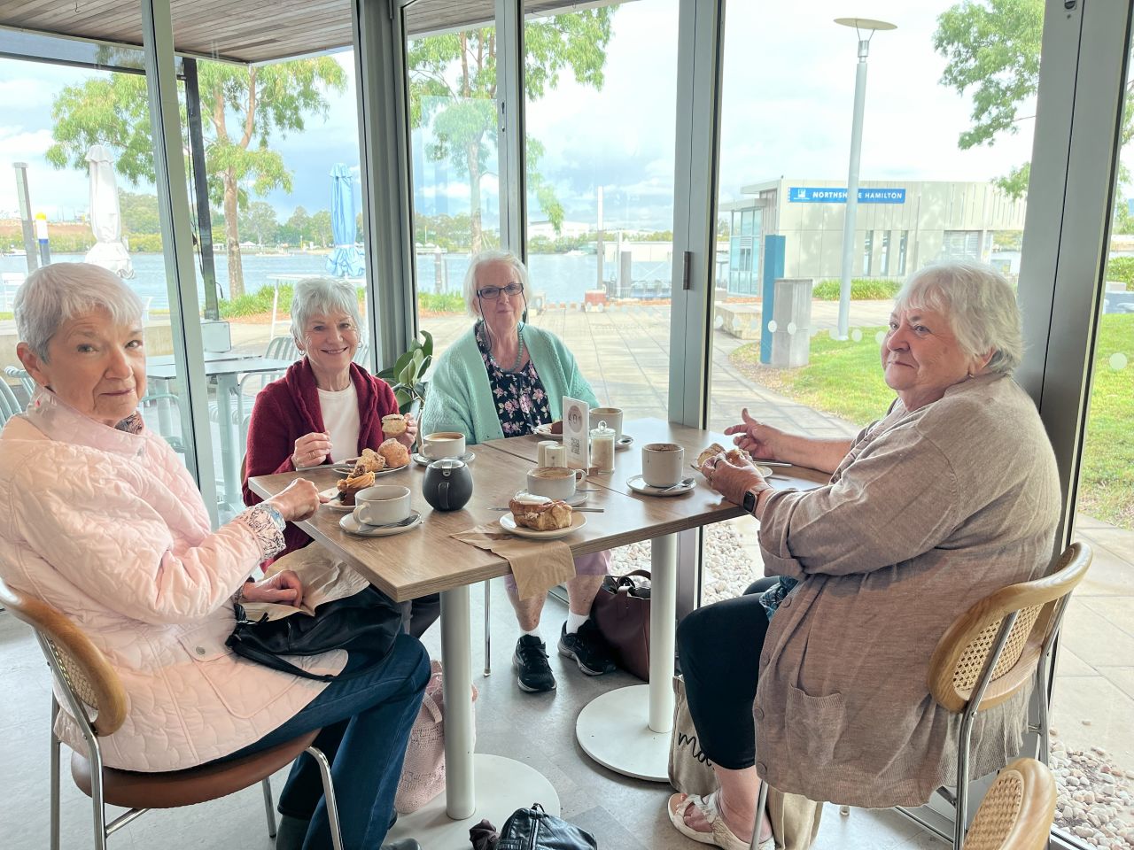 Members enjoying morning tea at Northshore Hamilton after a journey along the Brisbane River from Southbank by CityCat in June 2025