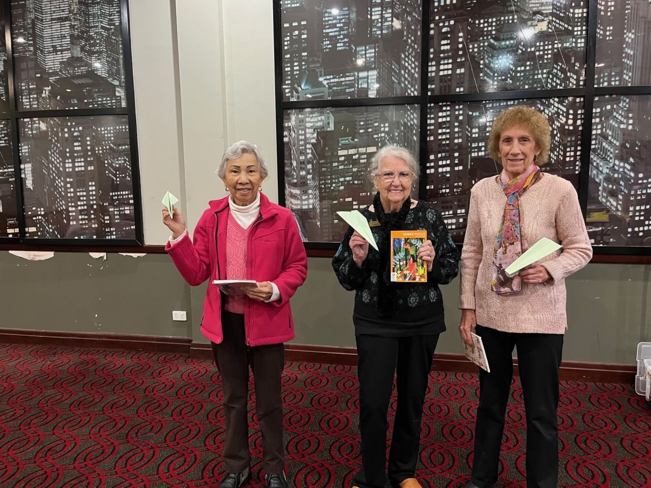 Winners of the 3rd annual paper plane competition during June 2025 meeting