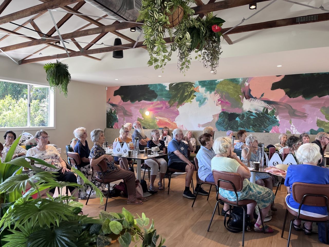 Members and guests focused on guest speaker presentations during April 2026 general meeting