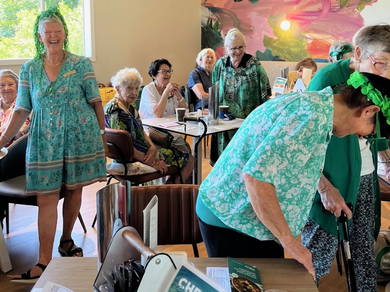 Many members participated in the Be Seen In Green theme to celebrate St. Patrick's Day during the March 2026 meeting