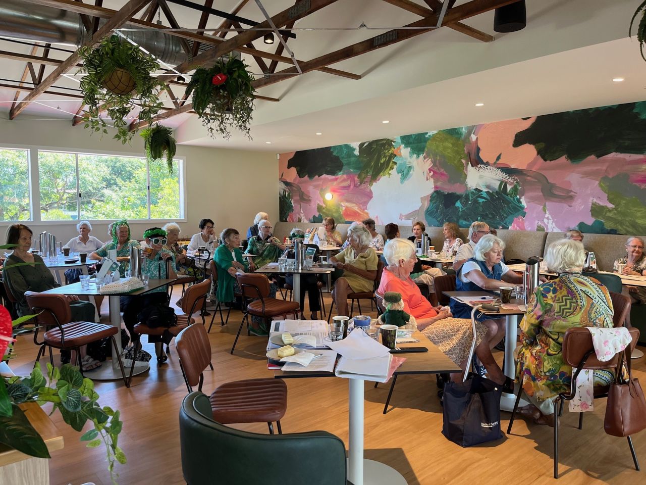 Members enjoying morning tea during the March 2026 monthly meeting