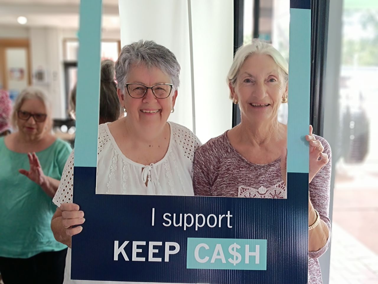 Pam & Carly showing their support for the Keep Cash Campaign at the second Digital Skills Workshop on 11/3/2026.
