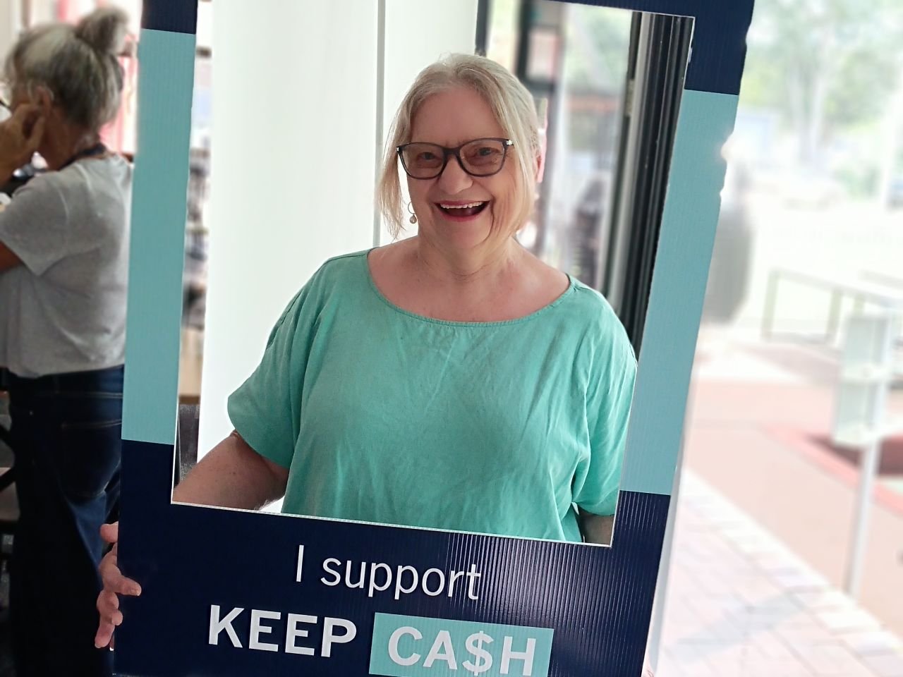 Helen showing her support for the Keep Cash Campaign at the second Digital Skills Workshop on 11/3/2026.