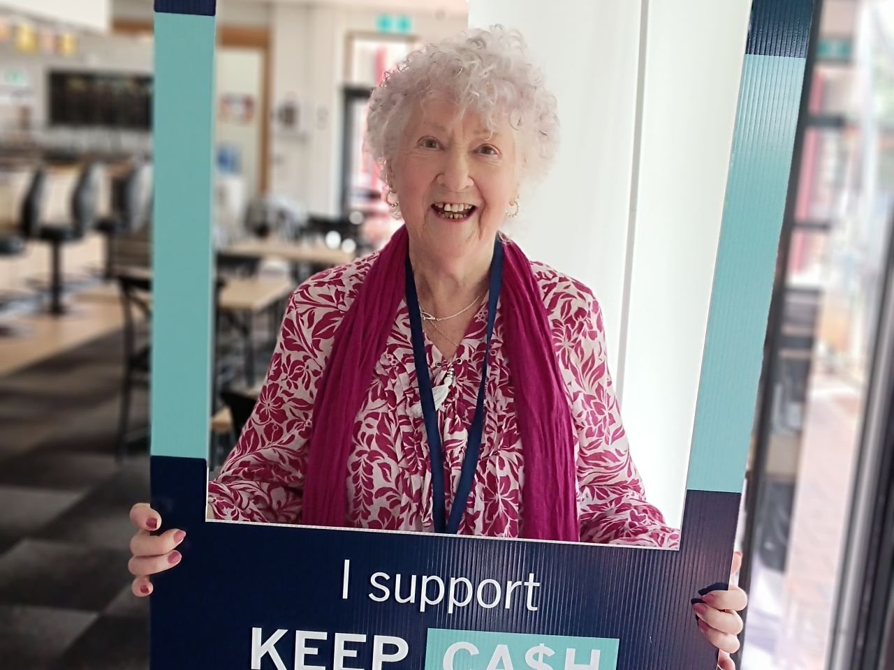 Dilys showing her support for the Keep Cash Campaign at the second Digital Skills Workshop on 11/3/2026.